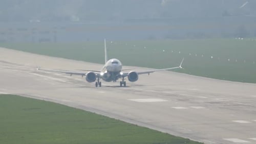 Experience the thrill of a passenger aircraft taking off from the runway