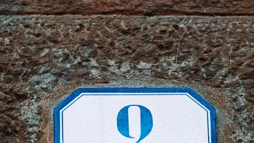 Number 2 (two) Affixed to a Building
