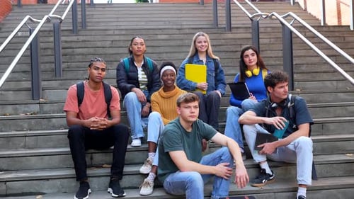 Group of Diverse University Students Sitting on Stairs