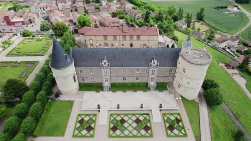 drone shot tilting down of the Chateau de Boutheon in Andrezieux Boutheon, Loire departement, France