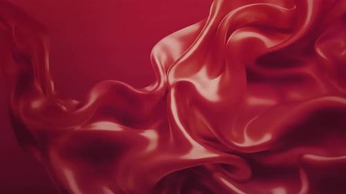 Elegant red silk fabric flowing in smooth, luxurious waves for background use