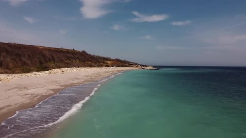 Aerial View Of Empty Beach With Turquoise Water