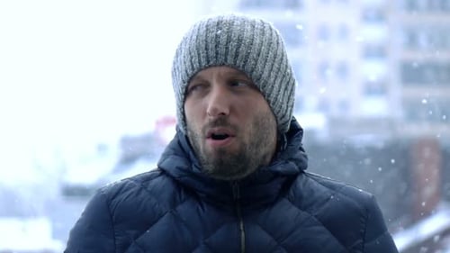 Young Man in City Feeling Cold During Blizzard, Super 240