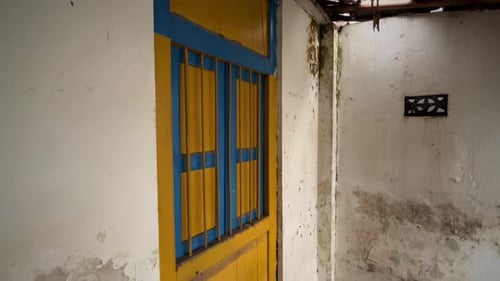 Painted Door in Worn, Urban Building