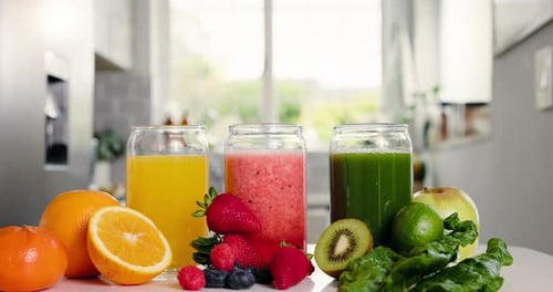 Healthy Fresh Fruit and Vegetable Smoothies in Kitchen