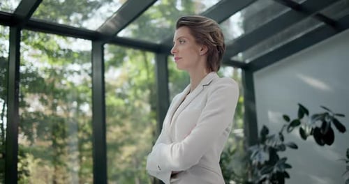 Portrait of Successful Young Business Woman Looking Serious Confident at Camera in Office Workspace