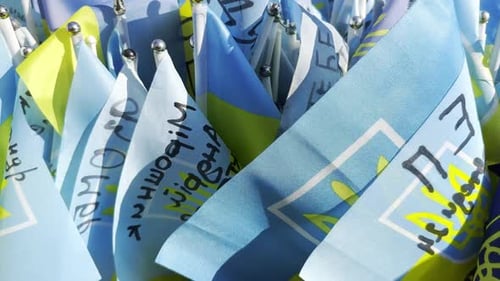 Many Small Flags of Ukraine with Names of the Dead War Against Russia Memorial of the Fallen