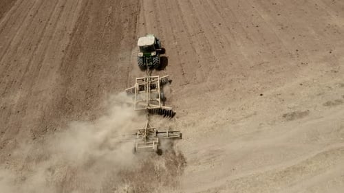 Tractor tilling in Judea Plain, Drone footage, Israel