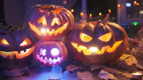 During Halloween celebrations and carved pumpkins flashing lanterns in thick smoke