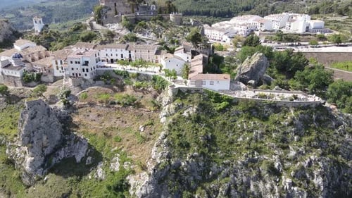 Impressive 11th century Castle and village on top of a rocky, sunny mountain.
