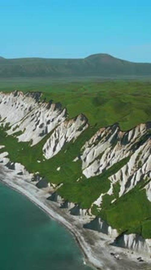 Bird Eye View of Calm Ocean and Stone Rock Cliffs at Oregon Coast Clip Aerial of the Ocean Water