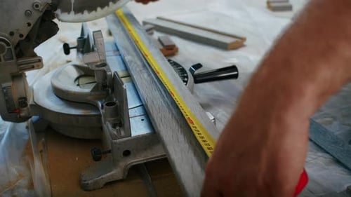 a Professional Male Master is Installing Doors in an Apartment