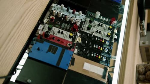 old displays of professional analog volume meters in a recording studio measuring and showing