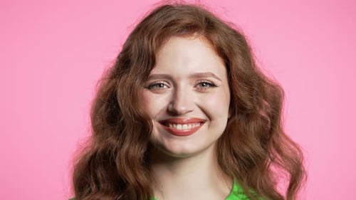 Gorgeous Woman in Green Outfit Showing Yes Signal Nods Head Approve Positive Smiling European Girl