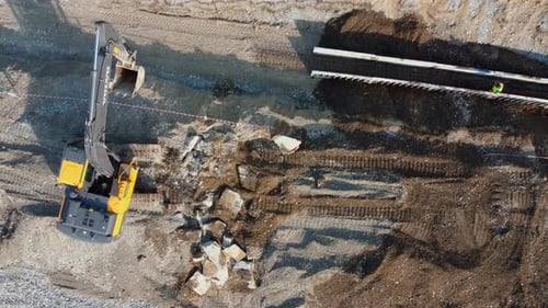 Aerial View of Excavator at Construction Site