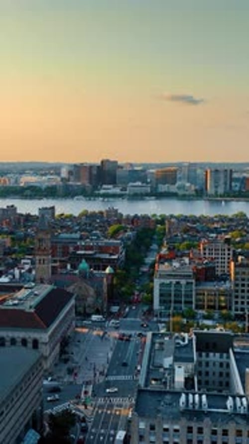 Flying between two beautiful tower blocks and opening view on the Charles River in Boston.