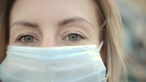 Close-Up Portrait of Modern Young Nurse Woman Wearing Protective Medical Face Mask