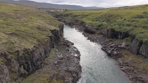 Icelandic River and Canyon on a Sunny Day Aerial View