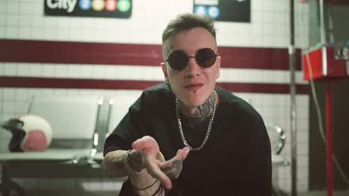Selfconfident Rap Artist Performing in Underground and Recording Music Video Portrait of Handsome