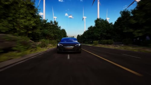 3D render of generic electric car drives on a Road with wind turbines in the background