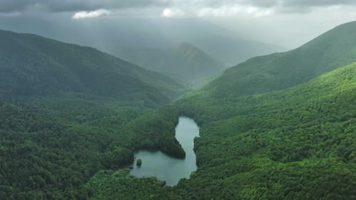 Clouds Over Summer Green Mountains