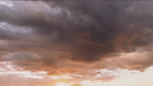 Stunning Timelapse of Dramatic Clouds Over the Sea at Sunset