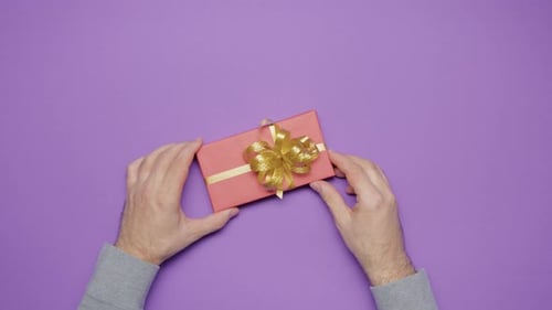 Beauty of Giving and Receiving Gifts Presents Between Man Woman Violet Top View Couple Celebrations