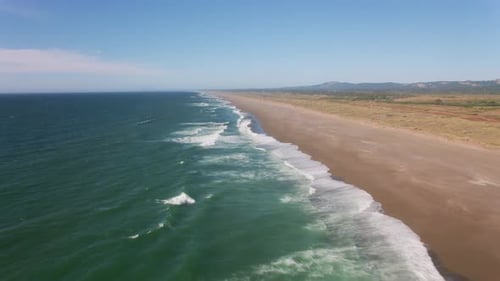 Oregon Coast Circa-2019. Aerial View of Waves Along Coastline. From Helicopter