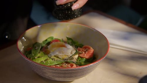 Restaurant dishes. Beautiful dishes salad and pasta for dinner in a beautiful large decorated dishes