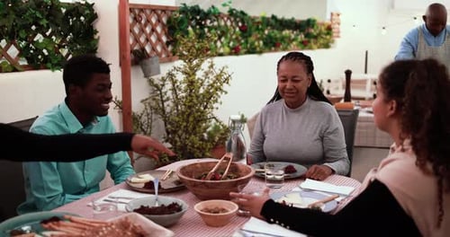 Family Enjoying Food and Time Together at Table