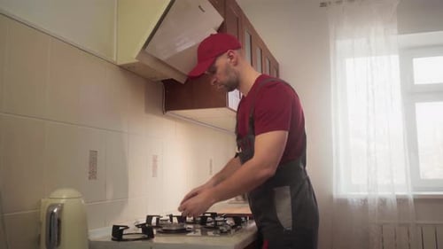 Gas Stove Installation By Professional Technician in Modern Kitchen