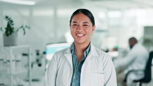 Smiling Scientist in Modern Bright Laboratory