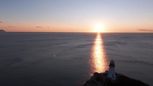 A Light House on a Rock in the Ocean