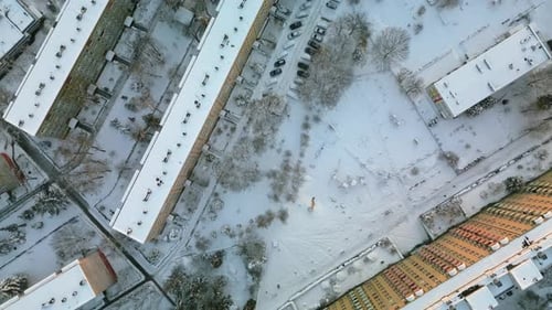 Snow Covered Cityscape From Above in Winter