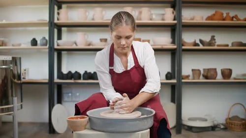 Pottery Workshop Young Woman Ceramist Makes a Pitcher Out of Clay Handicraft Production of Handmade