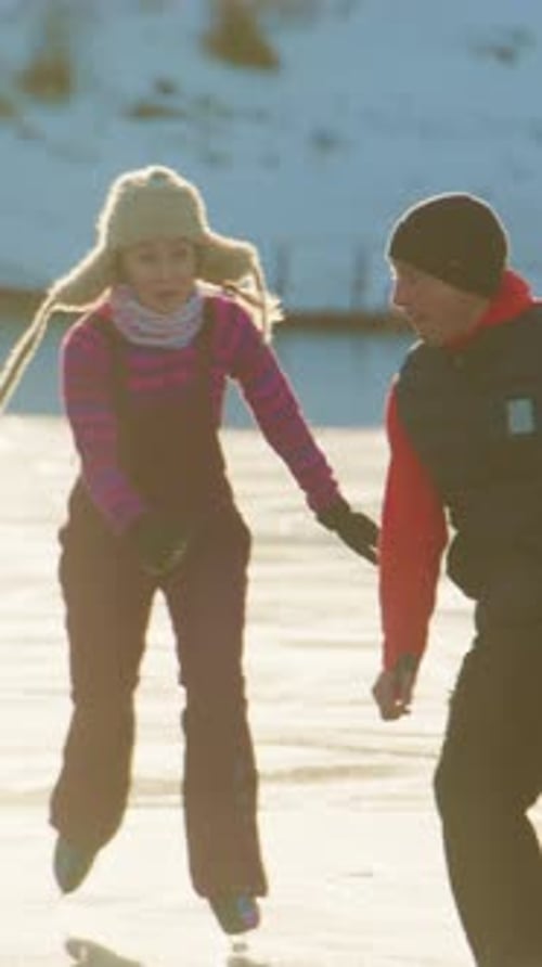 Exciting Moments on Ice Capture the Joy of Skating with Friends As They Glide Smoothly Across a