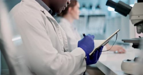 Man, scientist and writing with book for research, results or examination in forensics