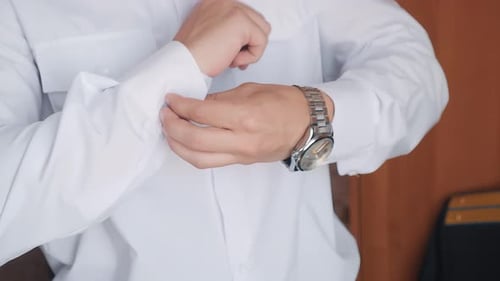 Young Adult Fastening Cuff of Elegant White Shirt