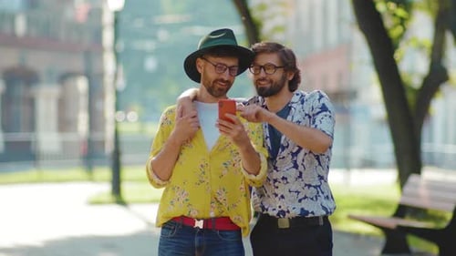 Close Up Two Gay Men Stand Use Phone at Sunlight Feel Happy Homosexual Couple Dating LGBT
