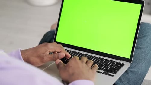 Black Man Using Laptop Notebook Viewing Green Screen Press Keyboard Browsing Chroma Key African