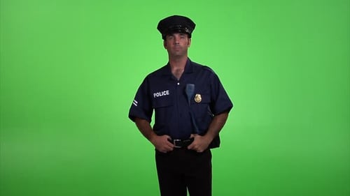 Confident police officer in uniform stands ready to protect and serve