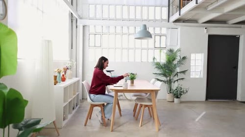 Woman Working From Home Office Using Laptop