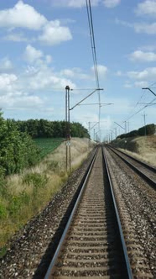 Vertical Rear View From Moving Train Onto Railway Track
