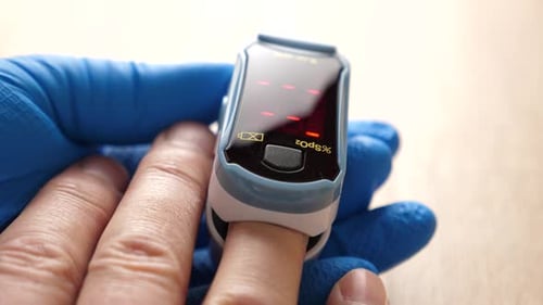 Fingertip Pulse Oximeter Measuring Oxygen Saturation