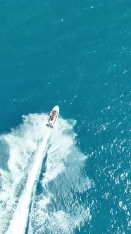 Aerial View: Jet Ski Ride on Blue Ocean Water