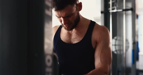 A Man Doing Tricep on a Block Exercise