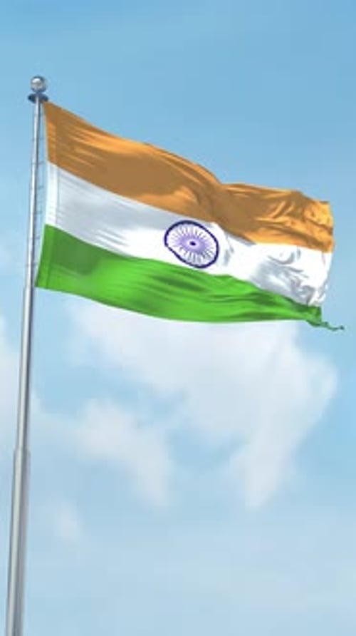 Realistic Indian Flag Waving on Flagpole Against Blue Sky