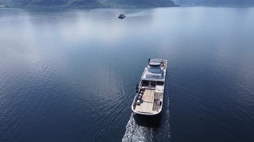 Ferry Oppedal from Norled company is transporting cars and passengers across Norwegian Sognefjord du