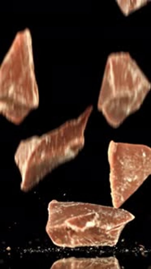 Super Slow Motion Pieces of Dark Milk Chocolate Filmed on a Highspeed Camera at 1000 Fps