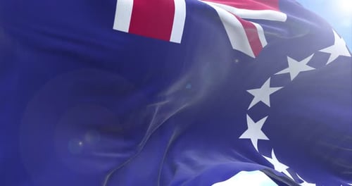 Cook Islands National Flag Waving in Blue Sky